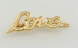 Broche folheado a ouro 18K escrito Amor.